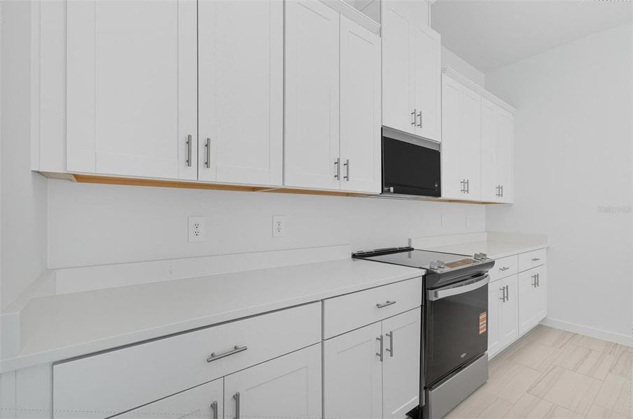 Furnished interior view inside a new home in , Palm Coast (Image 13). Furnished interior view inside a new home in , Palm Coast (Image 13).