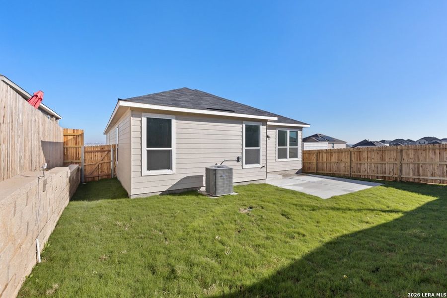 Exterior details and patio area of a home in Knox Ridge, Converse (Image 21).