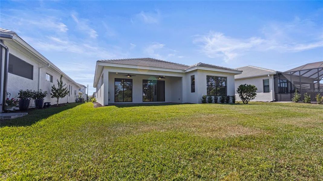 Exterior details and patio area of a home in Cresswind Lakewood Ranch, Lakewood Ranch (Image 4).