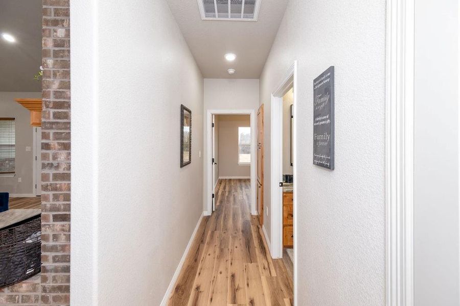 Hall featuring light hardwood / wood-style floors