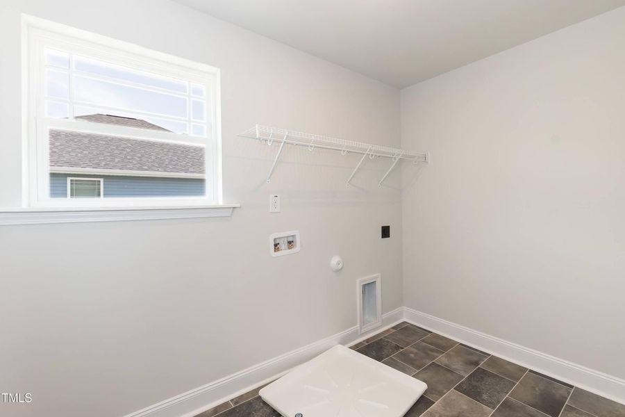 Representative unfurnished interior of a home built from the 2709 by Adams Homes in The Grove at Ballard, Jacksonville (Image 33).