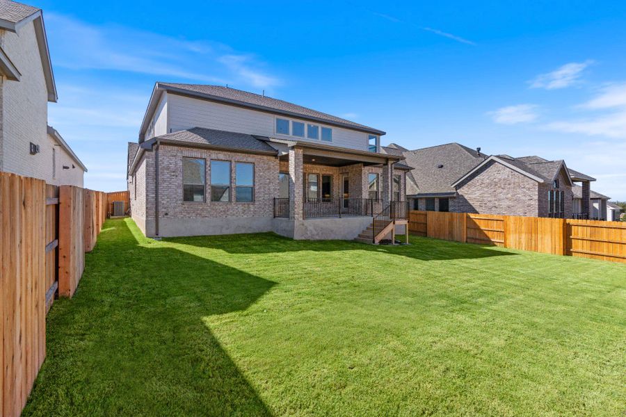 Rear of Home and Private Backyard