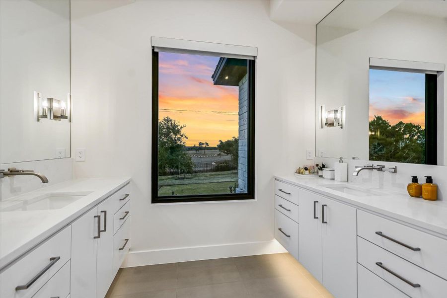 Full bath with two vanities and light tile patterned flooring Full bath with two vanities and light tile patterned flooring