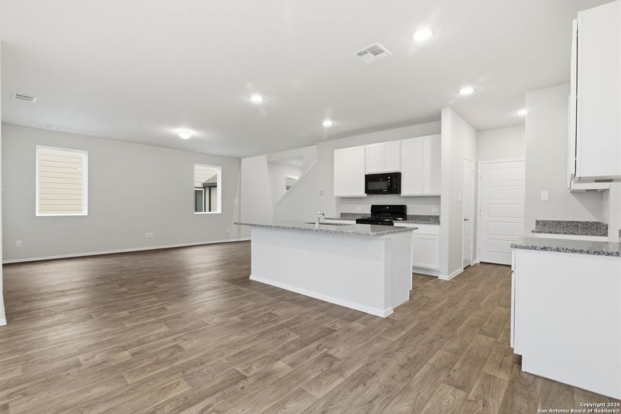 Furnished interior view inside a new home in Hunters Ranch, San Antonio (Image 11).
