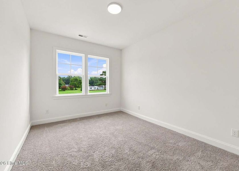 Spacious, unfurnished interior of a new home in Dixon Grove, Grimesland (Image 20).
