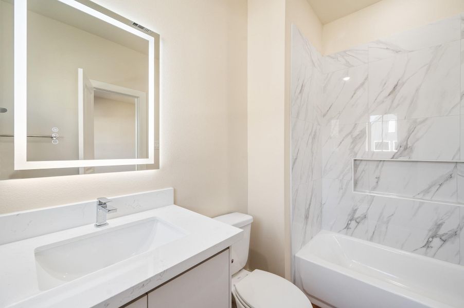 Furnished interior view inside a new home in Metro Village, Houston (Image 9).