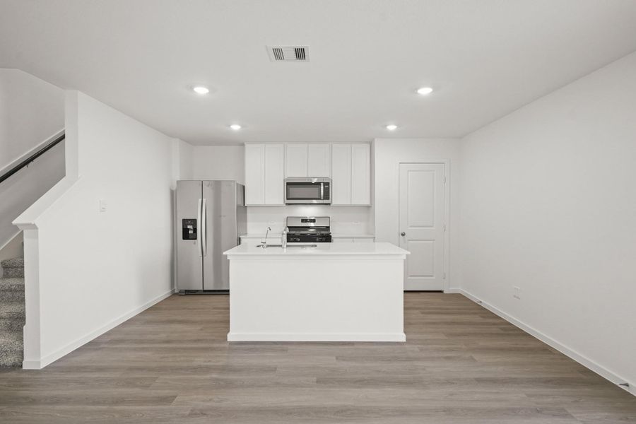 Furnished interior view inside a new home in Sunterra, Katy (Image 3). Furnished interior view inside a new home in Sunterra, Katy (Image 3).
