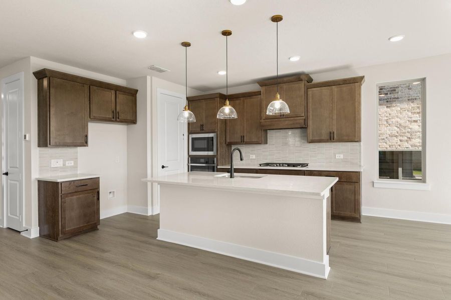 Furnished interior view inside a new home in Garden Collection at Union Park, Little Elm (Image 5).