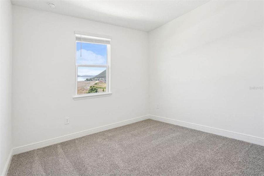 Spacious, unfurnished interior of a new home in Cyrene at Minneola - Villas, Minneola (Image 14).