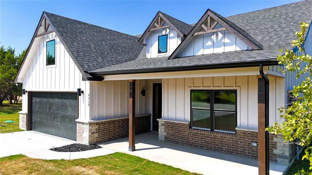 Front exterior of a new home in , Granbury, TX, highlighting curb appeal (Image 17). Front exterior of a new home in , Granbury, TX, highlighting curb appeal (Image 17).