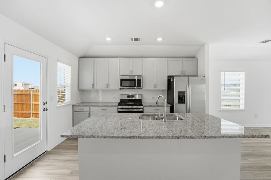 Furnished interior view inside a new home in Longview, Del Valle (Image 4).