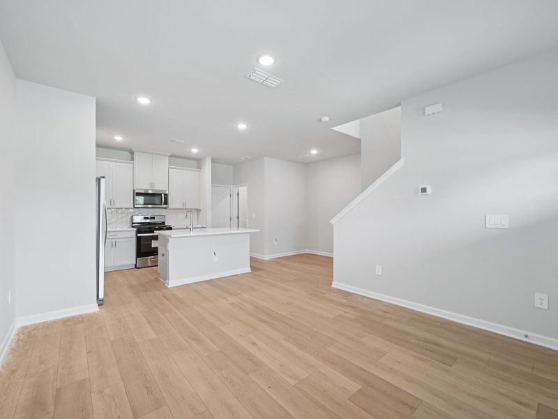 Spacious, unfurnished interior of a new home in The Rows at Buffaloe Reserve, Raleigh (Image 11).