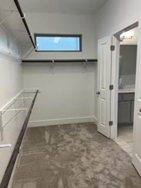 Primary  suite walk-in closet