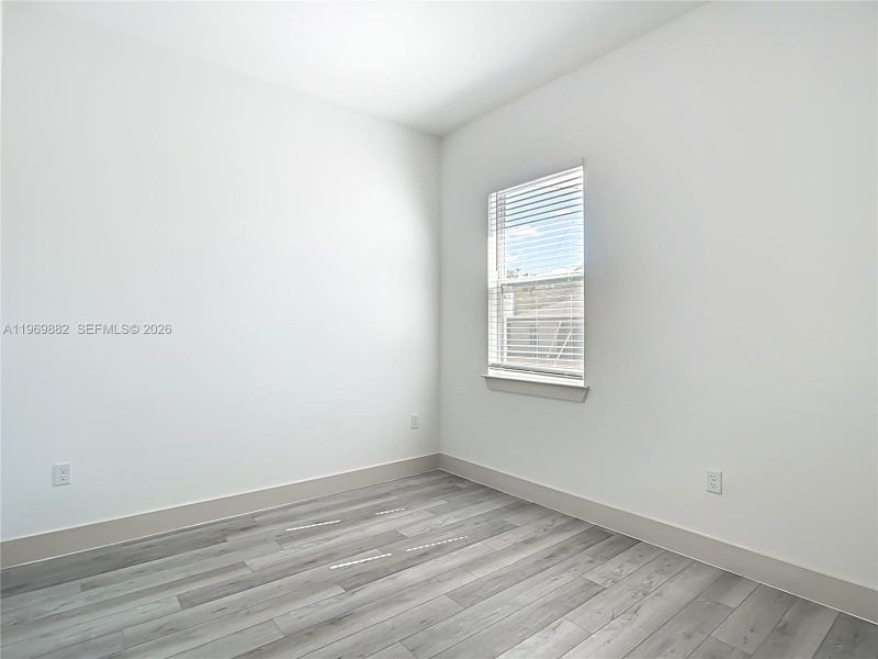 Spacious, unfurnished interior of a new home in , Port Charlotte (Image 29).