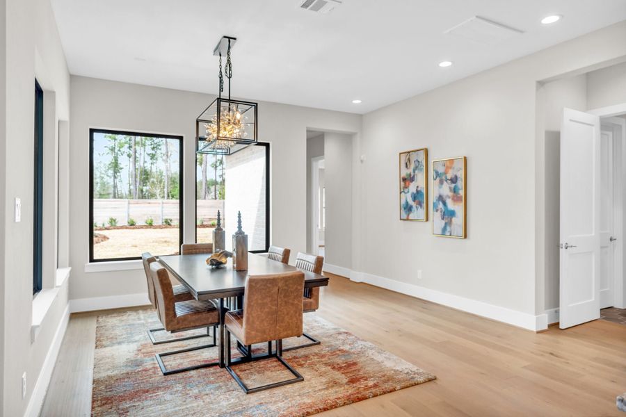 Furnished interior view inside a new home in ARTAVIA, Conroe (Image 8).