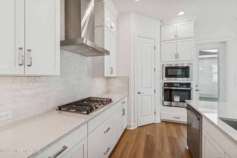 Furnished interior view inside a new home in Seven Pines 24' Rear Entry Townhomes, Jacksonville (Image 12).