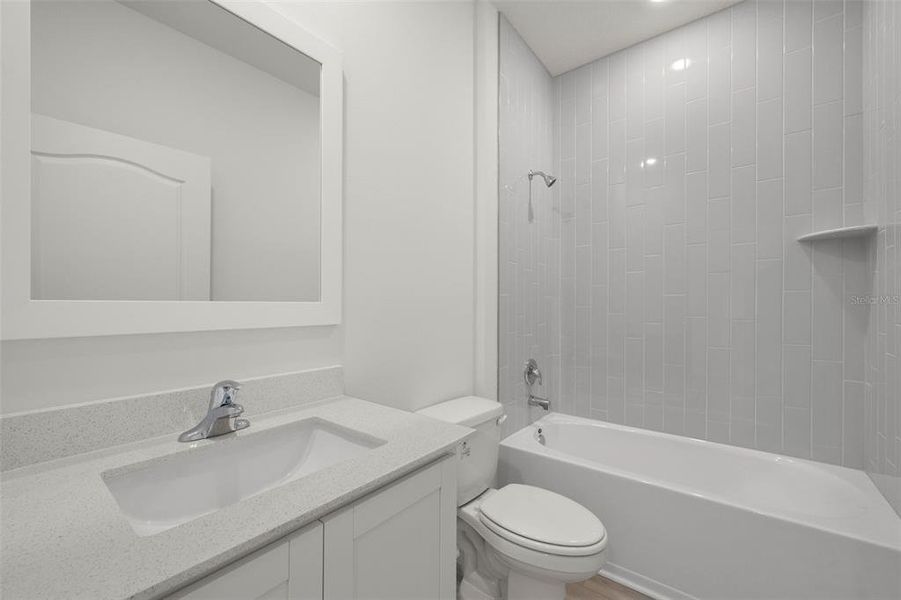 Furnished interior view inside a new home in Peach Crossings, Winter Haven (Image 8).