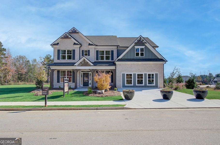 Front exterior of a new home in Summerlin, Winder, GA, highlighting curb appeal (Image 1). Front exterior of a new home in Summerlin, Winder, GA, highlighting curb appeal (Image 1).