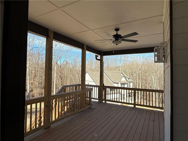 Exterior details and patio area of a home in River Rock, Ball Ground (Image 33).
