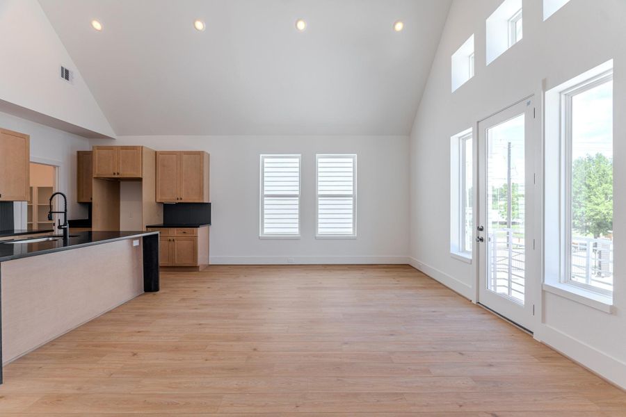 This bright and airy open-concept space invites natural light to flood in, offering a glimpse into the modern lifestyle of this vibrant community.Photo Disclaimer: Photos are representative of the community and may depict a similar floor plan, model home, or previously completed residence. This bright and airy open-concept space invites natural light to flood in, offering a glimpse into the modern lifestyle of this vibrant community.Photo Disclaimer: Photos are representative of the community and may depict a similar floor plan, model home, or previously completed residence.