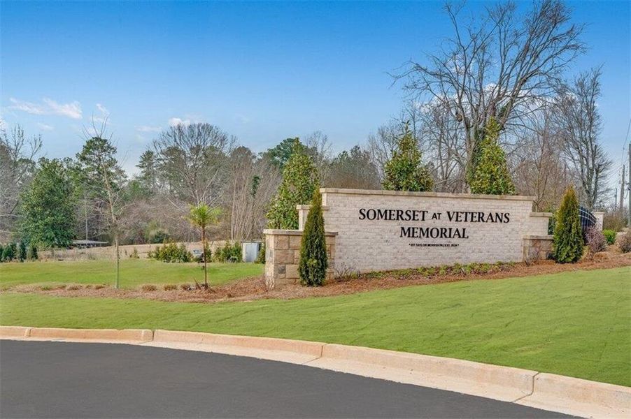 Front exterior of a new home in Somerset at Veterans Memorial, Mableton, GA, highlighting curb appeal (Image 2).