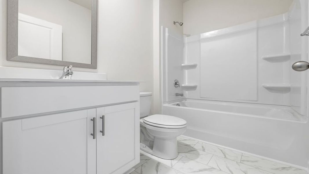 Furnished interior view inside a new home in Bentley Park, Greenwood (Image 5). Furnished interior view inside a new home in Bentley Park, Greenwood (Image 5).