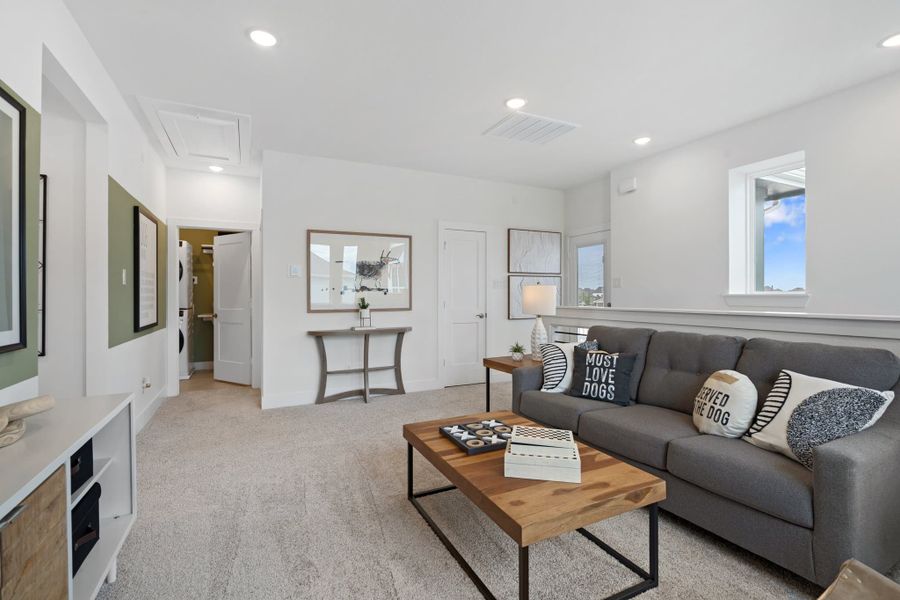 Furnished interior view inside a new home in Bridgeland, Cypress (Image 12).
