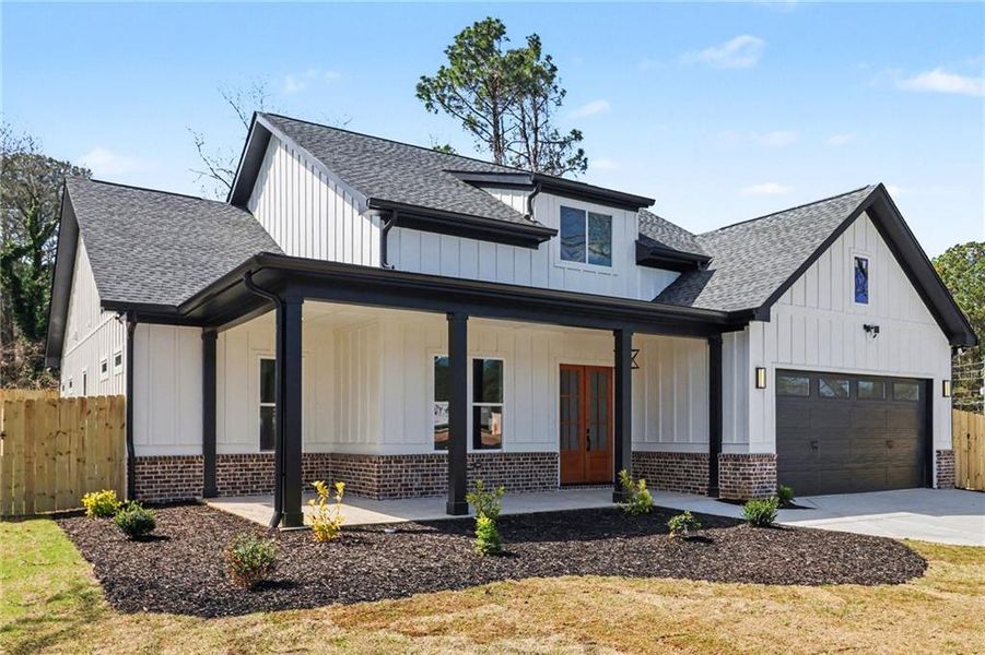 Front exterior of a new home in , Lawrenceville, GA, highlighting curb appeal (Image 27).