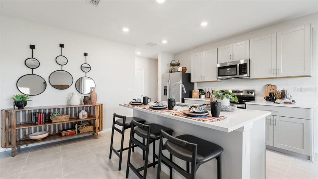 Furnished interior view inside a new home in Coasterra Community Group Page, Palmetto (Image 12).