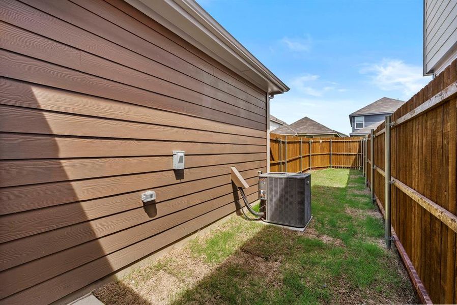 Exterior details and patio area of a home in Orchard Village, Fort Worth (Image 3). Exterior details and patio area of a home in Orchard Village, Fort Worth (Image 3).