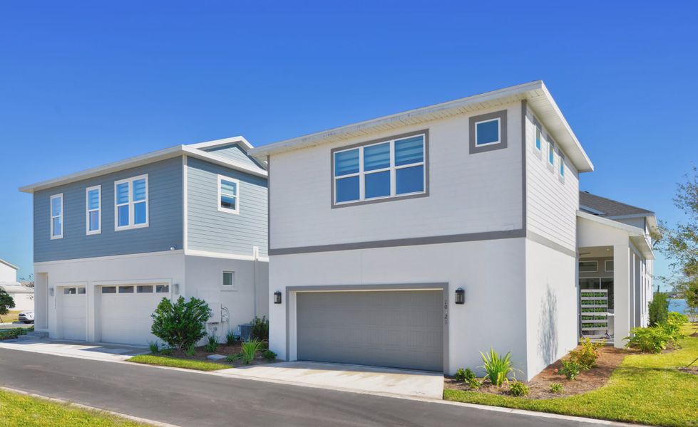Front exterior of a new home in Laureate Park, Orlando, FL, highlighting curb appeal (Image 21).