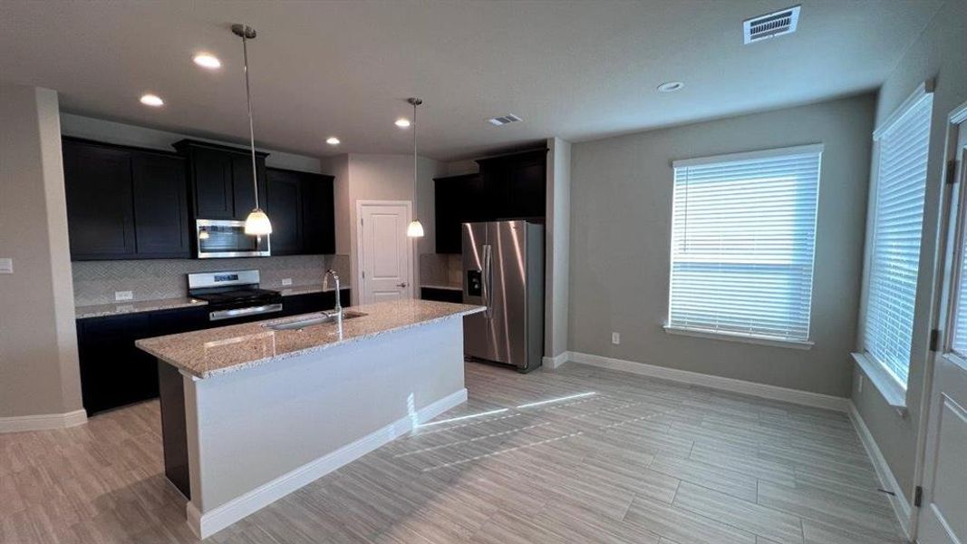 Furnished interior view inside a new home in Bluestem, Rhome (Image 4).