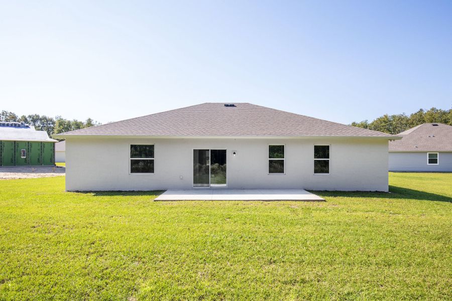 Exterior details and patio area of a home in Palm Coast, Palm Coast (Image 4). Exterior details and patio area of a home in Palm Coast, Palm Coast (Image 4).