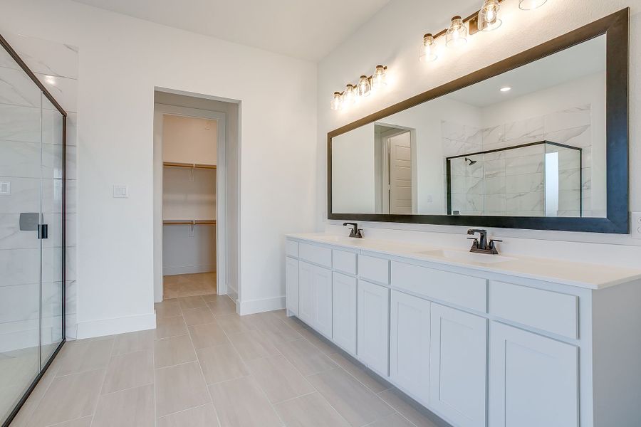 Representative furnished interior of a home built from the Valera by Graham Hart Home Builder in Bear Ridge, Burleson (Image 10).