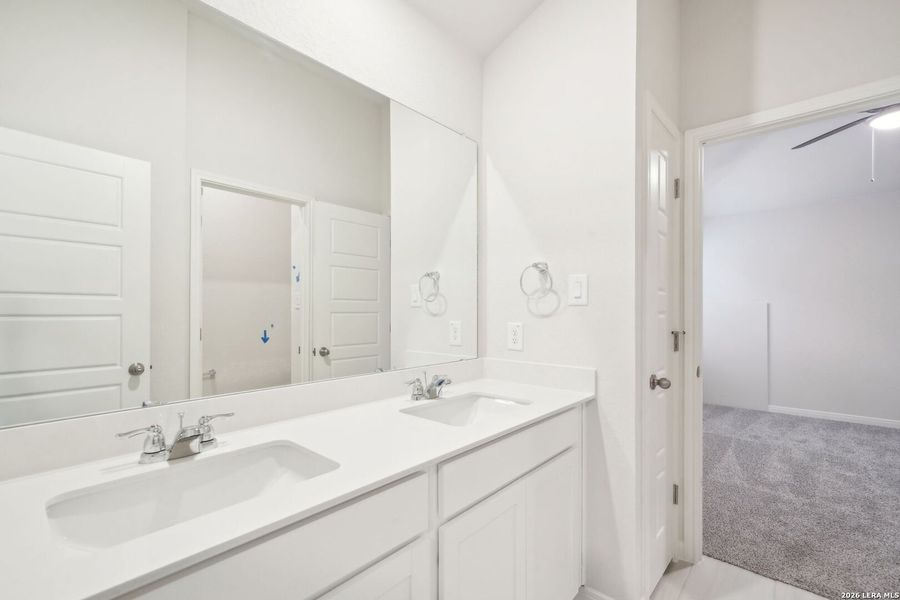 Furnished interior view inside a new home in Estancia Ranch - Classic Series, San Antonio (Image 13).