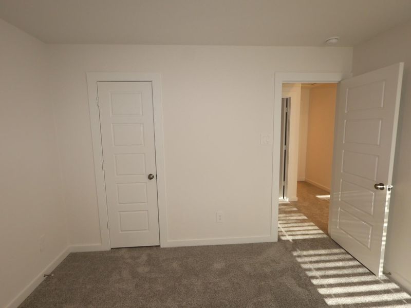 Spacious, unfurnished interior of a new home in Pinewood at Grand Texas, New Caney (Image 31).