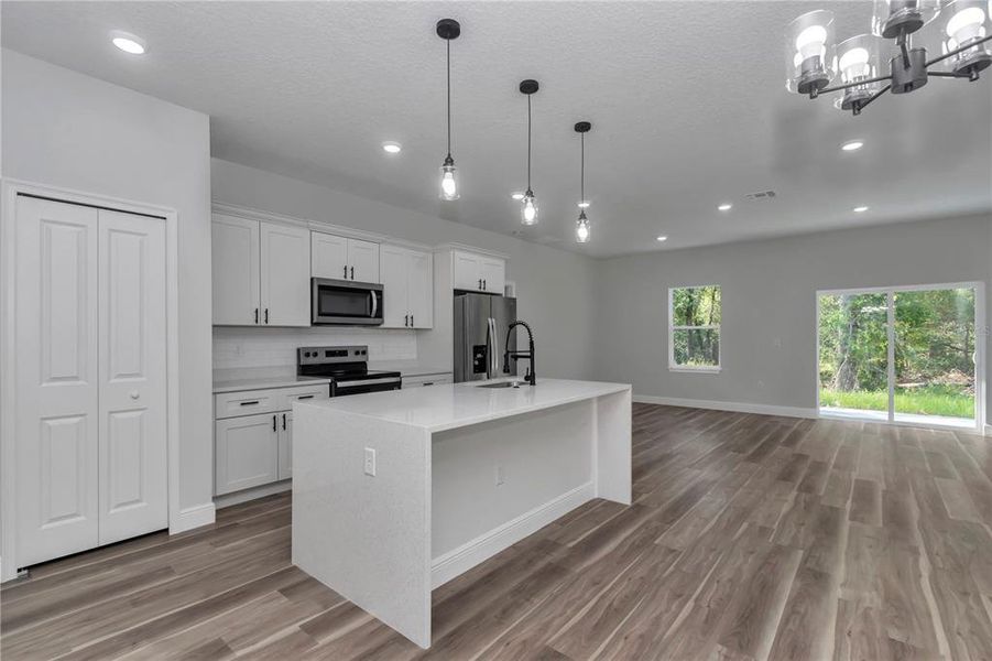 Furnished interior view inside a new home in , Dunnellon (Image 7).