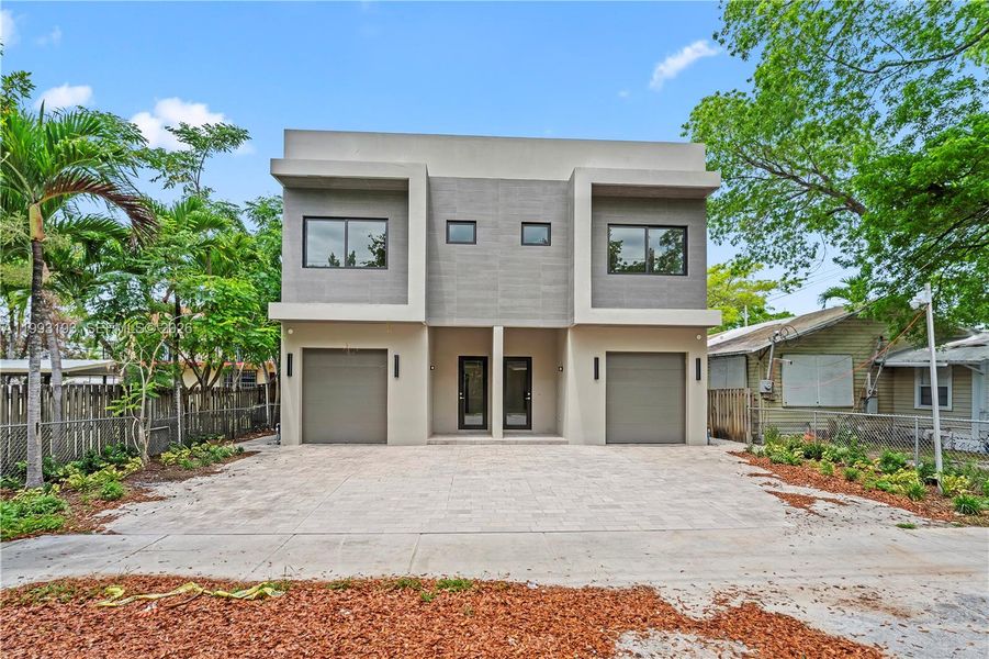 Front exterior of a new home in , Miami, FL, highlighting curb appeal (Image 20). Front exterior of a new home in , Miami, FL, highlighting curb appeal (Image 20).