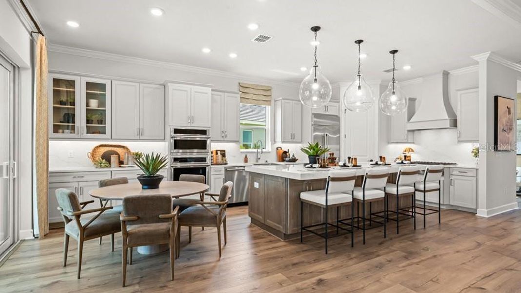 Furnished interior view inside a new home in Esplanade at Wellen Park, Englewood (Image 11).