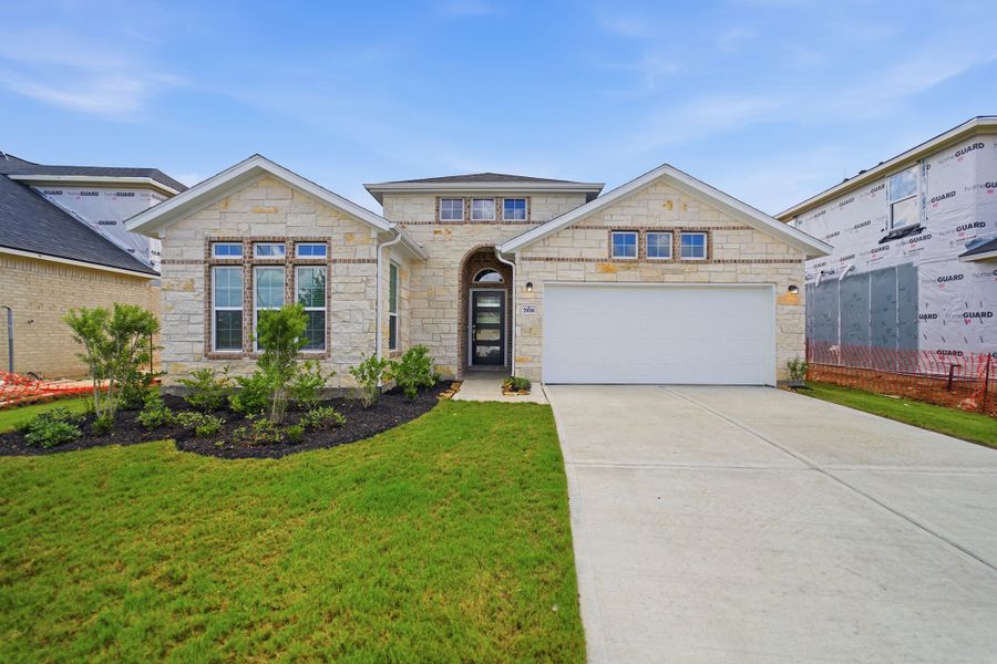 Front exterior of a new home in Ashland, Richwood, TX, highlighting curb appeal (Image 2).