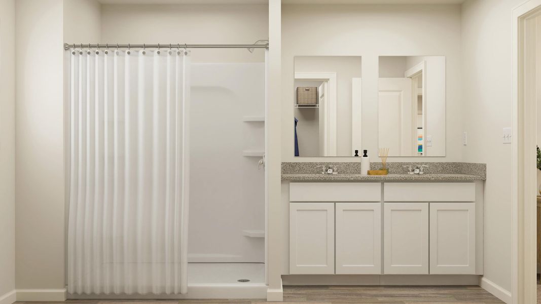 A bathroom with a shower curtain.