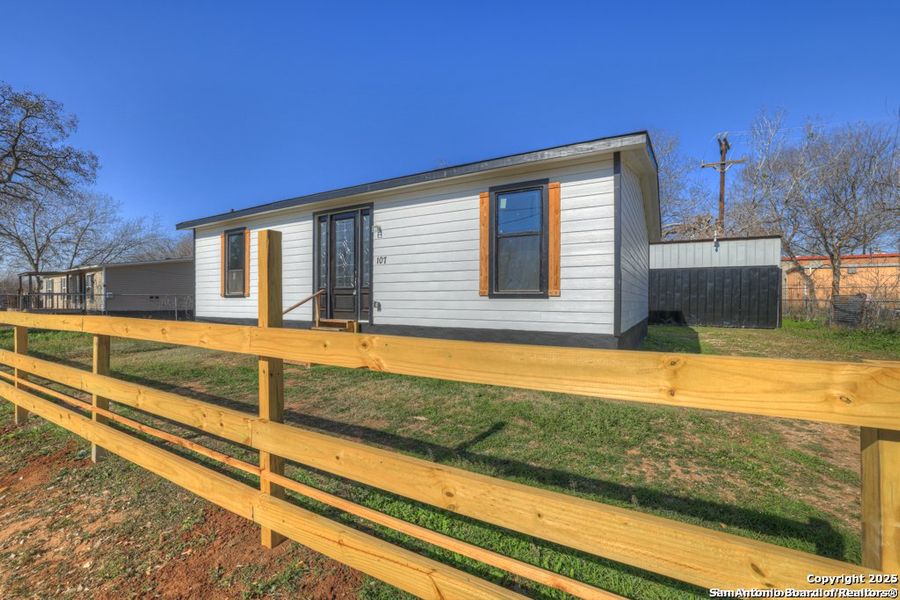 Front exterior of a new home in , San Antonio, TX, highlighting curb appeal (Image 17). Front exterior of a new home in , San Antonio, TX, highlighting curb appeal (Image 17).