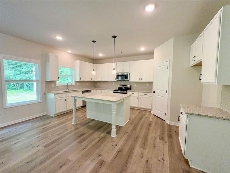 Furnished interior view inside a new home in , Buford (Image 5). Furnished interior view inside a new home in , Buford (Image 5).