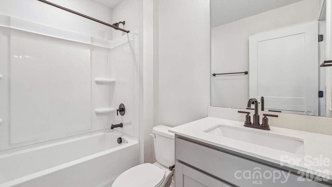 Furnished interior view inside a new home in The Townes at Lake Norman, Mooresville (Image 8).