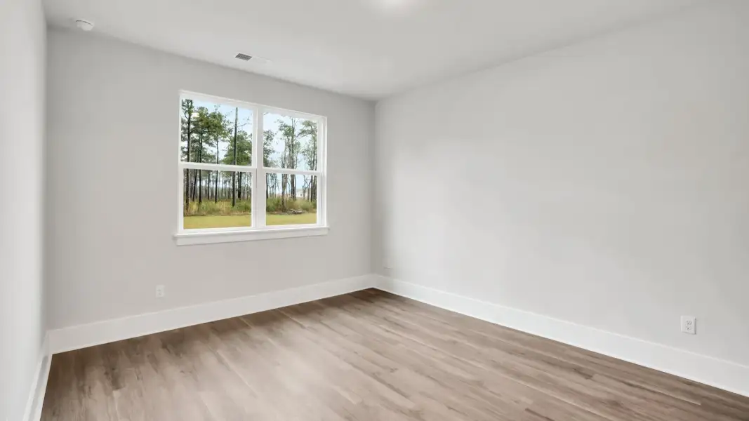 Representative unfurnished interior of a home built from the Claiborne by D.R. Horton in The Highlands at Cedar Hill Landing, Navassa (Image 29).
