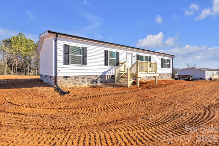 Exterior details and patio area of a home in , Taylorsville (Image 16).