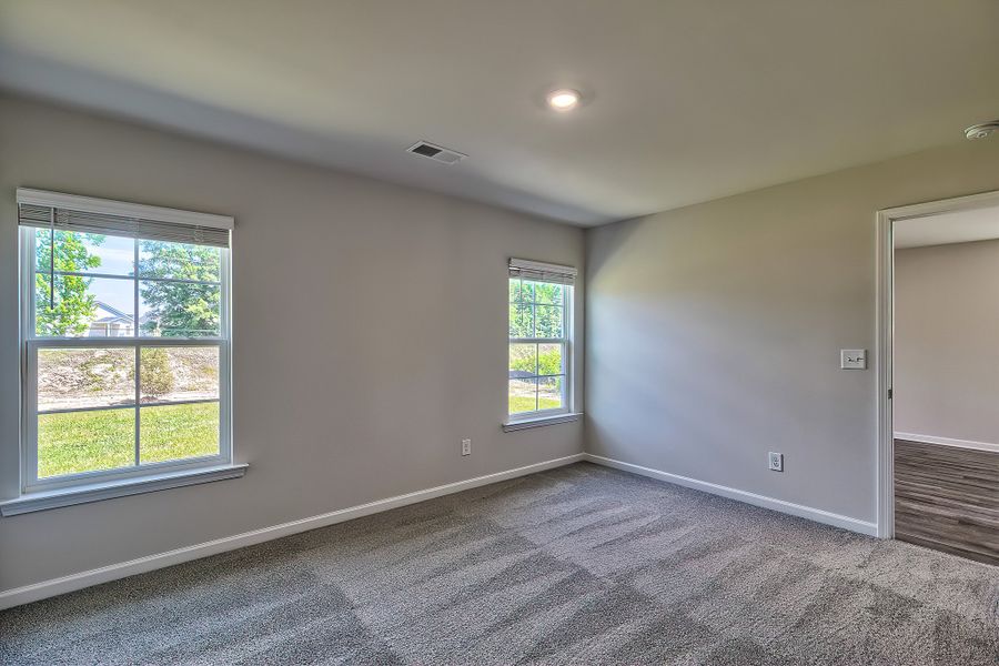 Representative unfurnished interior of a home built from the Juniper by McGuinn Homes in Hunters Branch, Hopkins (Image 13).
