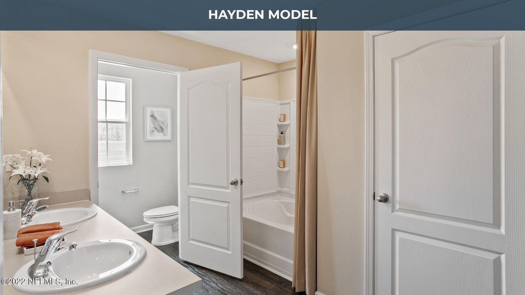 Furnished interior view inside a new home in Cross Creek Express, Green Cove Springs (Image 8).