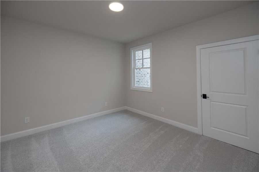 Spacious, unfurnished interior of a new home in Ward's Crossing Townhomes, Johns Creek (Image 41).