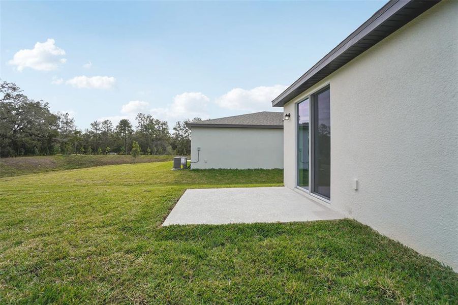 Exterior details and patio area of a home in , Brooksville (Image 3).